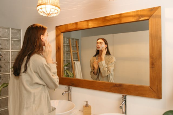 A woman working on the tips for hydrating oily skin under oily skincare regime. 